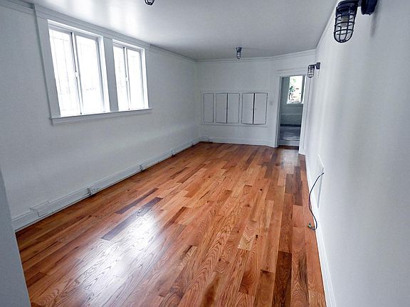 Main space looking toward kitchen and garden.