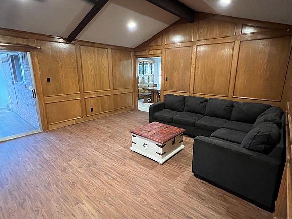 Large den is the hub of the home.