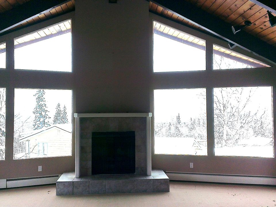 Big Windows & Fireplace in living room