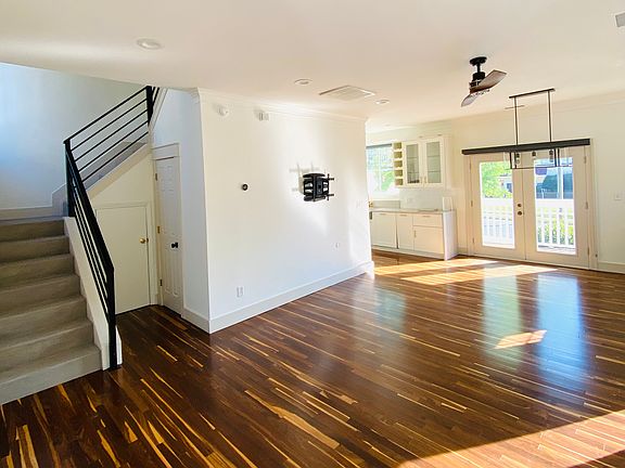 Open concept main level with hardwood floors
