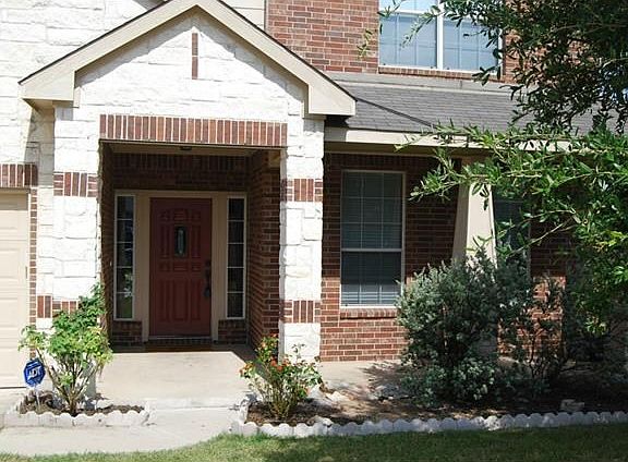 4 Sides Masonry and Concrete Siding. Covered Entry. Home shows p