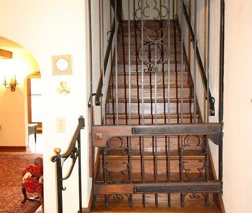 Stairs up to 2nd floor with gate