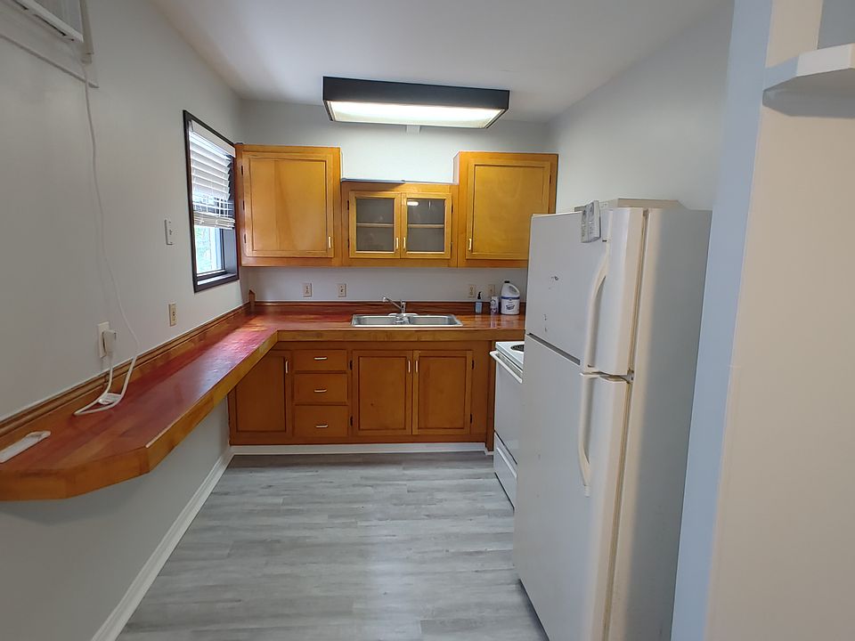 Kitchen with varnished wood counters