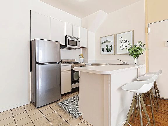 3rd image of 21 E 9th St #5E