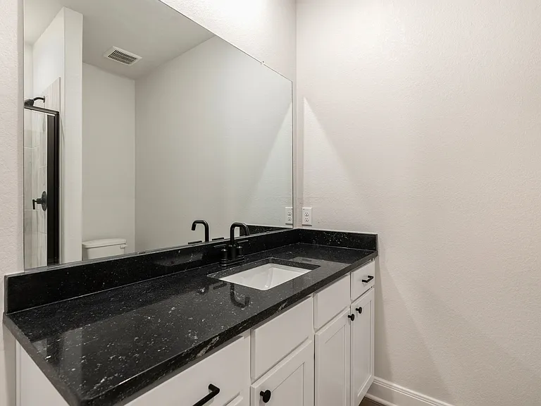 Spacious vanity in the master bathroom.