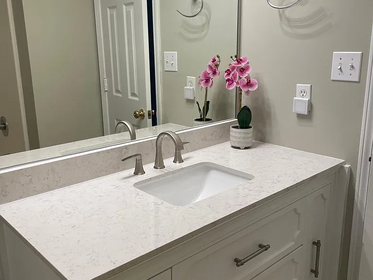 Second bath is located between the 2nd and 3rd bedrooms. Very nice new vanity, and new tile floor, Tub with shower