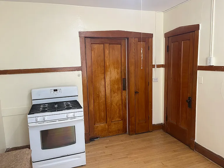 Doors next to stove is a butler door, built in spice closet, Large walk in pantry.