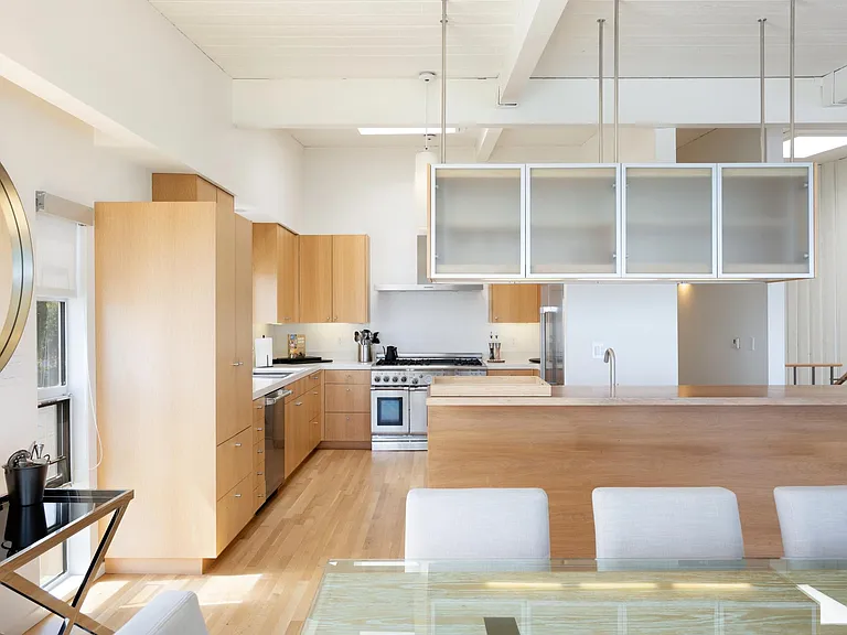 The kitchen is private yet open, with plenty of space to cook up a gourmet meal.