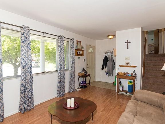 Note the updated engineered hardwood floors!