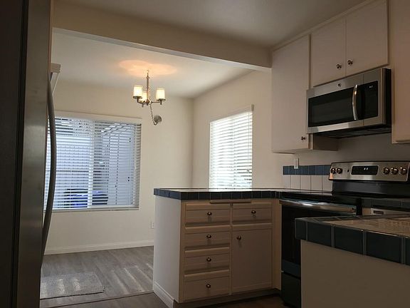 Inside Kitchen to dining area also have walk out sliding  do