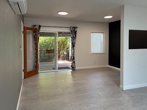 Dining area or home office nook with chalkboard wall