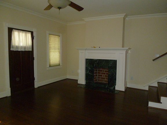 Living room with decorative fireplace