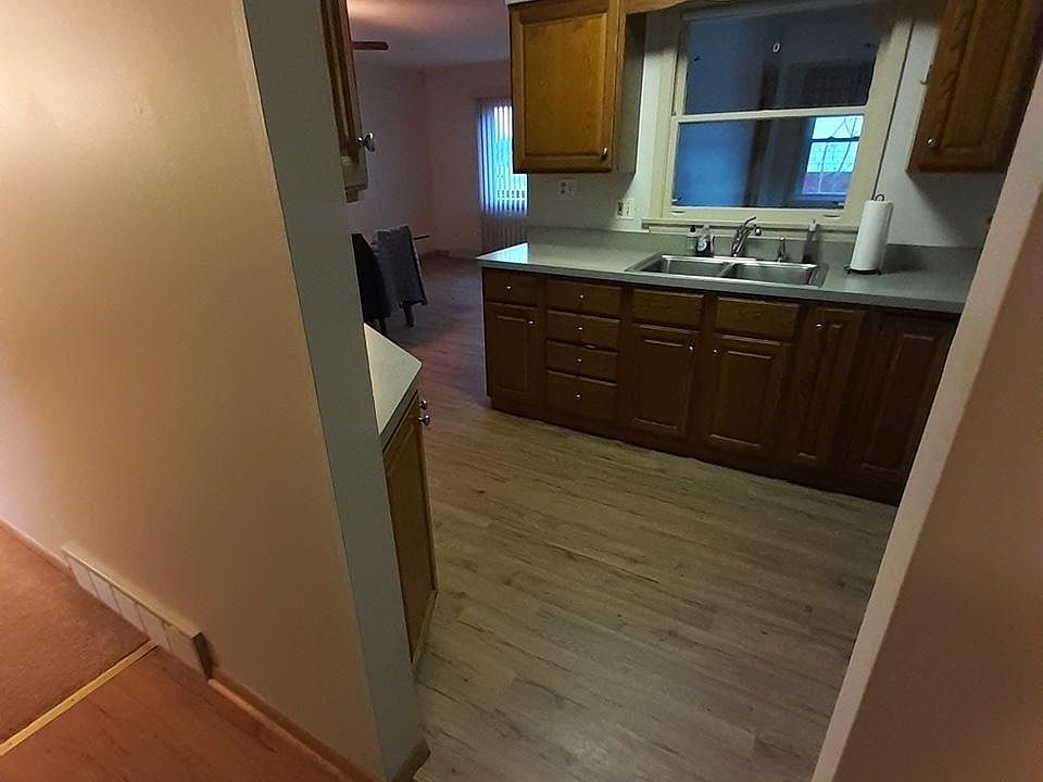 Kitchen, Dining and Hall-Wood Laminate Floor