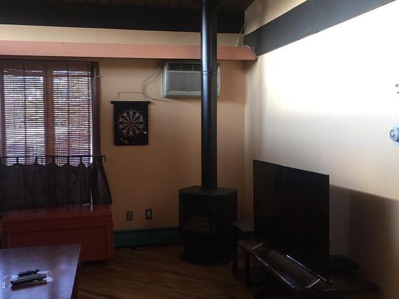 Freestanding gas heater with great flames is included for ambience and extra heat.