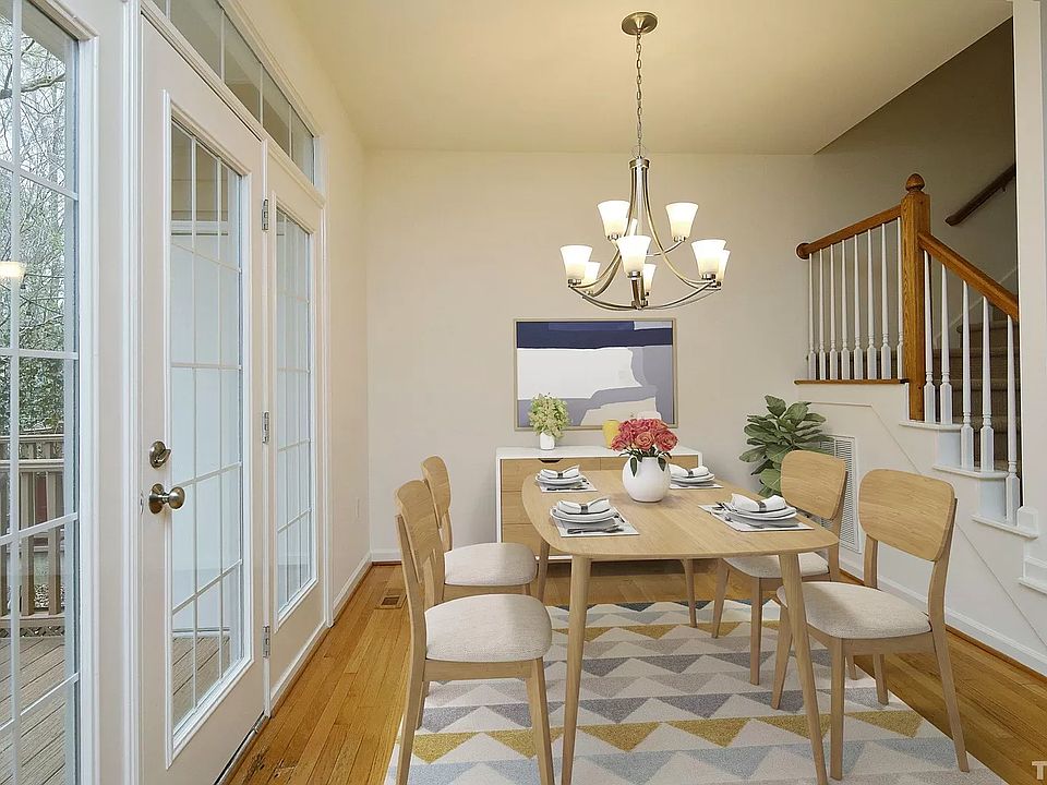 Dining area across from kitchen and adjacent to the deck. Main floor.