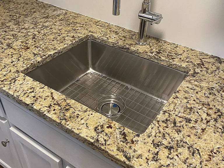 New sinks and faucets in the kitchen and bath.