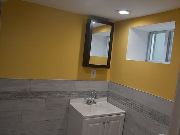 4th image of 10204 Farmers Blvd