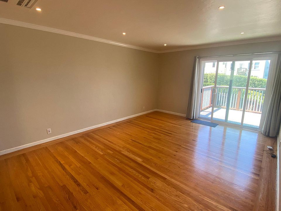 Living room with glass slider to deck