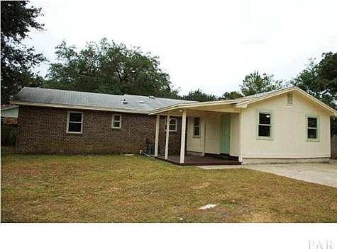 HOME SITS ON LARGE LOT