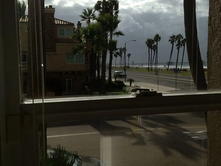 through stairs case window: moody clouds for poetic inspirations on your way to your furnished bedroom for SINGLE OCCUPANCY.