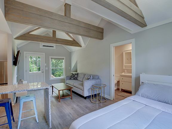 Living space & bedroom (looking to entrance)