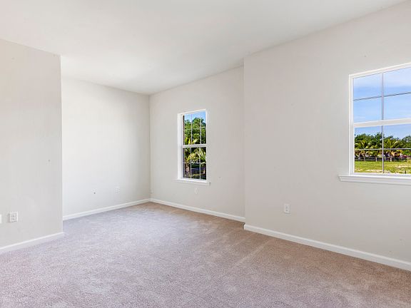 Spacious owner s suite with plenty of natural light and large walk-in closet