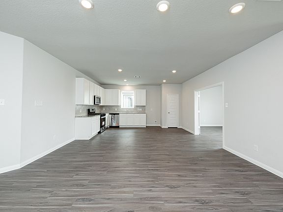 Family Room to Dining Area, Kitchen, and Flex Room