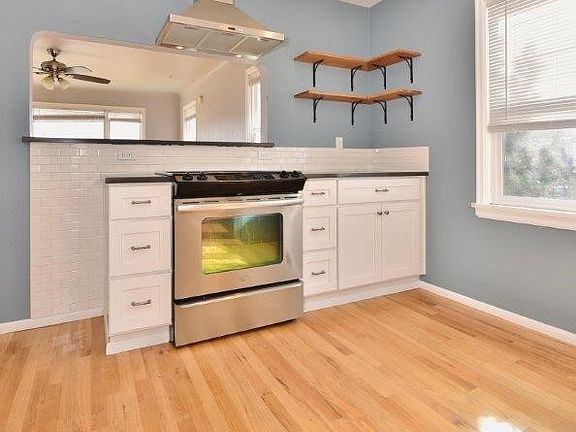 This kitchen has been completely remodled with Stainless Steel appliances, self closing drawers, hardwood floors