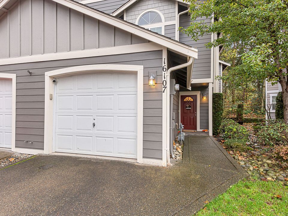 Front of home. 1 Car garage and driveway parking.