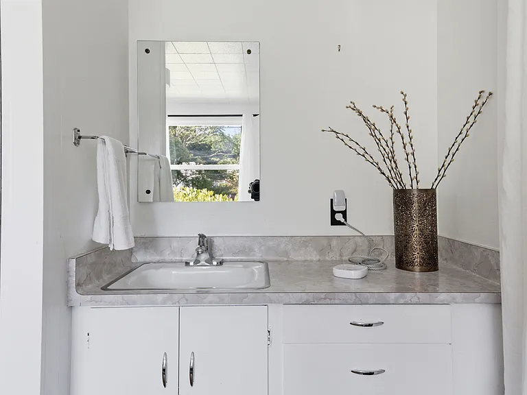 Vanity and sink in secondary bedroom