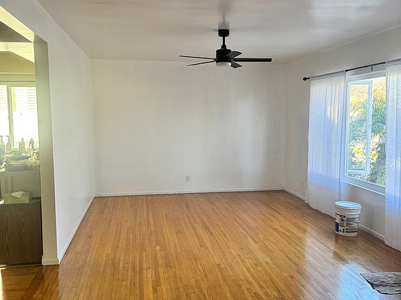 Living room with large window and natural lighting