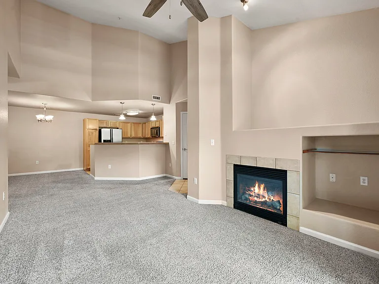 Living Room: gas fireplace, ceiling fan, flow to kitchen/dining/entry