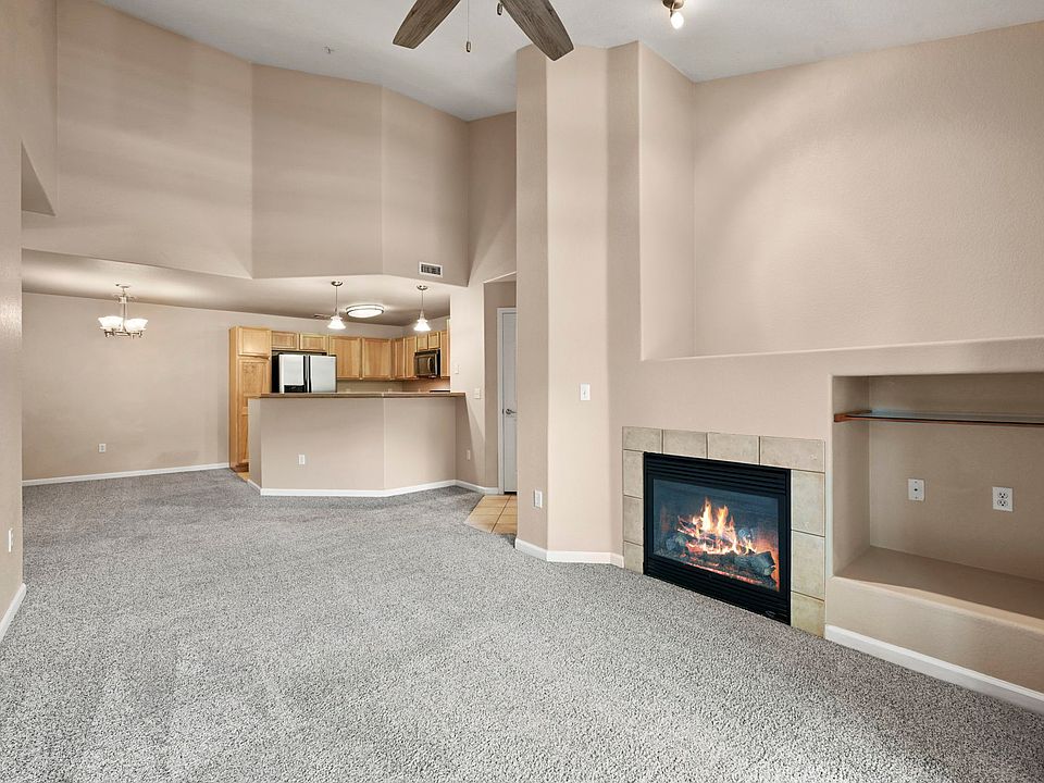 Living Room: gas fireplace, ceiling fan, flow to kitchen/dining/entry