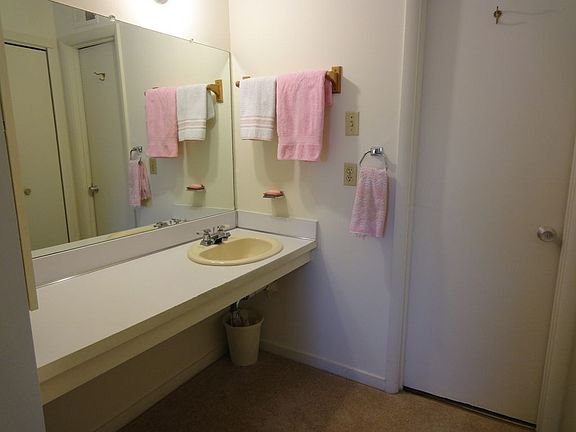 Dressing Area with Three Double Closets!