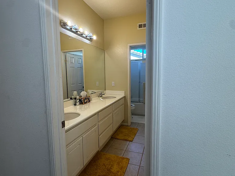 View of shared bathroom from North Wing Hallway.