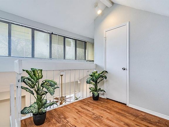 This is the loft space that looks down over the living room. Look at all those windows. The apartment has great natural light.