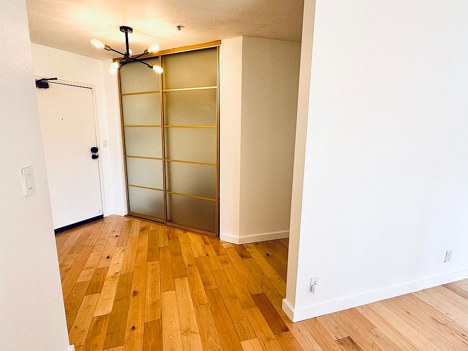 Entry door, lobby, and coat/storage closet