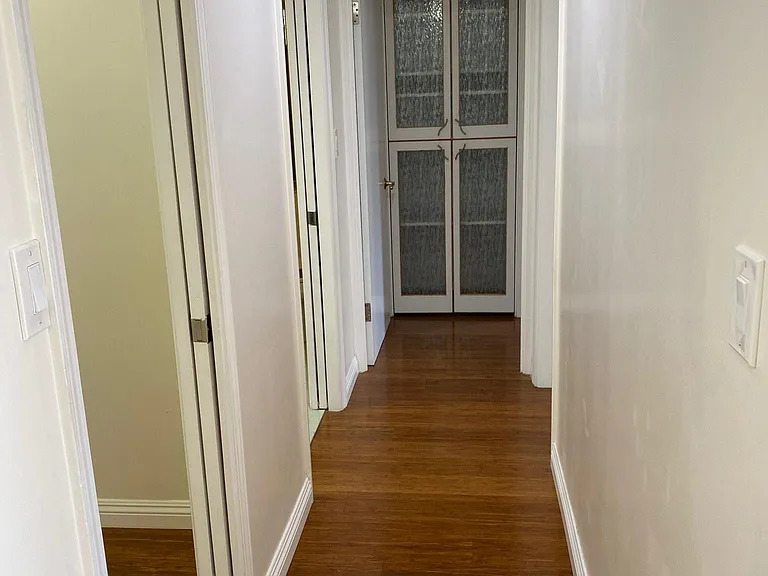 Hallway area to rooms and bathroom