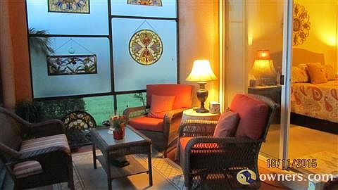 Glass slider allows direct access to lanai from master bedroom