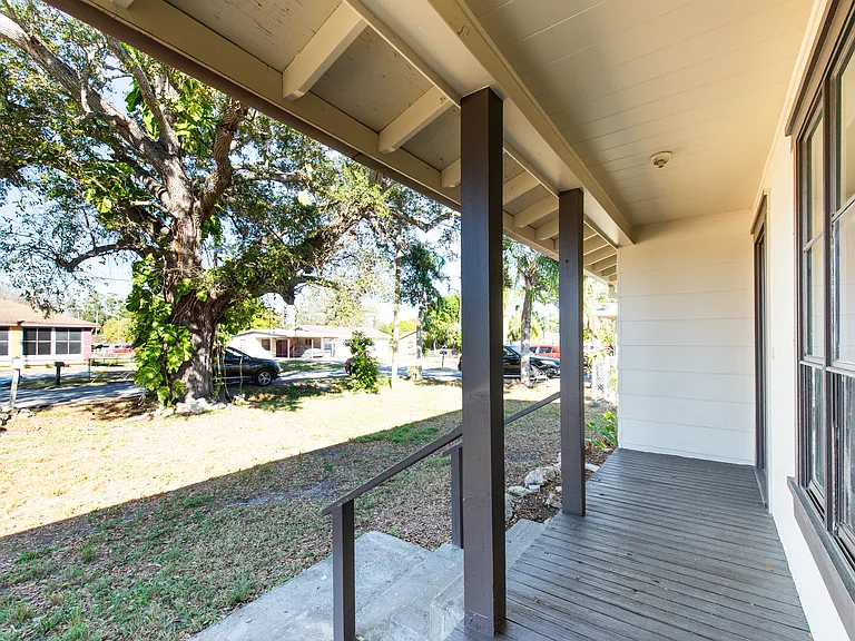 A welcoming front porch that's perfect for morning coffee, evening relaxation, or greeting guests.