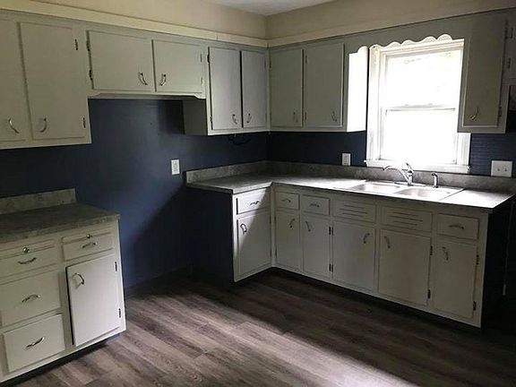kitchen new flooring. lots of cabinets