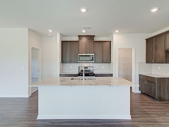 Spacious kitchen island perfect for entertaining.