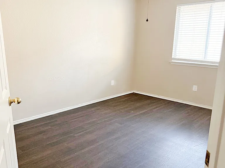 2nd bedroom with ceiling fan/light.