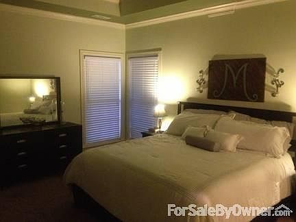 Master Bedroom
						:
						Tranquil lounging with trayed ceilings