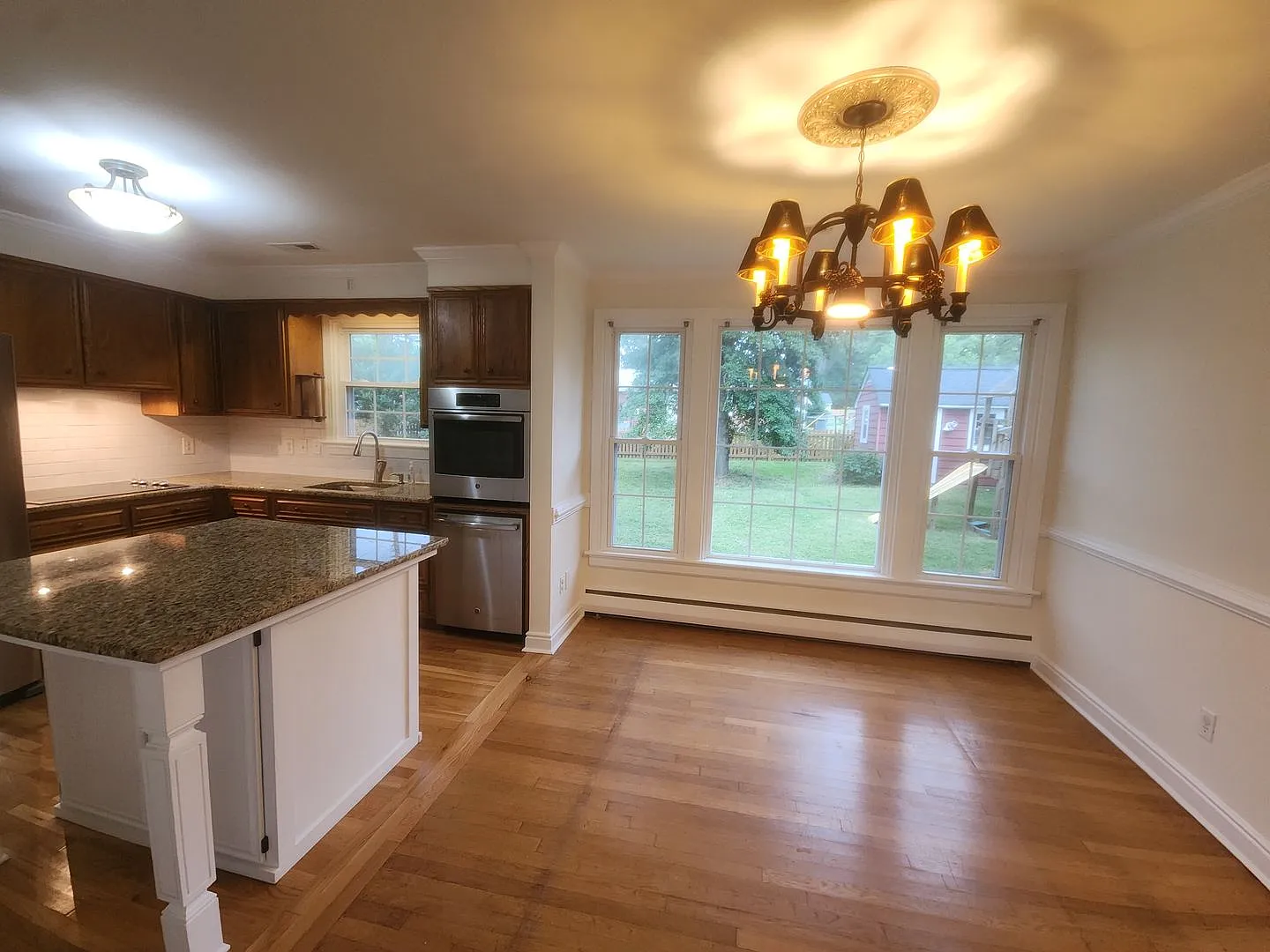 Spacious 3 Bedroom 2 Bath Rancher with Fenced Rear Yard and Carport! — Photo 4