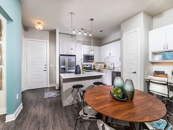 2 bedroom living space with built-in desk