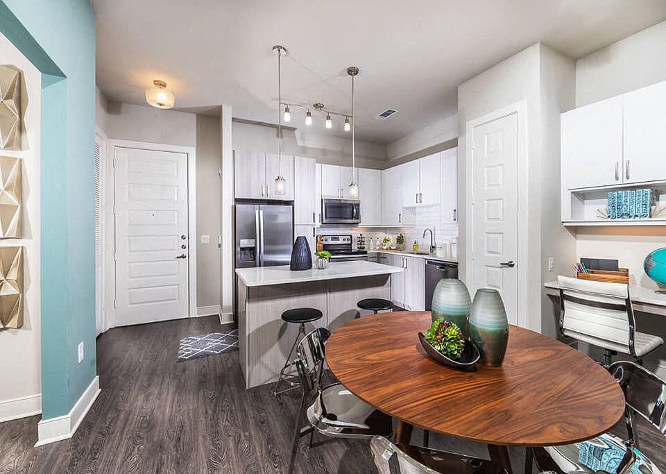 2 bedroom living space with built-in desk