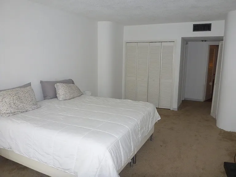 View of King Size bed with Closet in background
