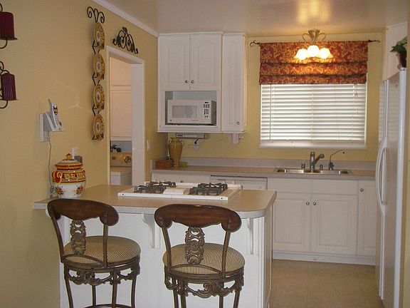Remodled kitchen with new cabinets, counters and newer appliances
