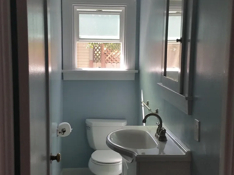 has new bathtub/shower ,tile flooring